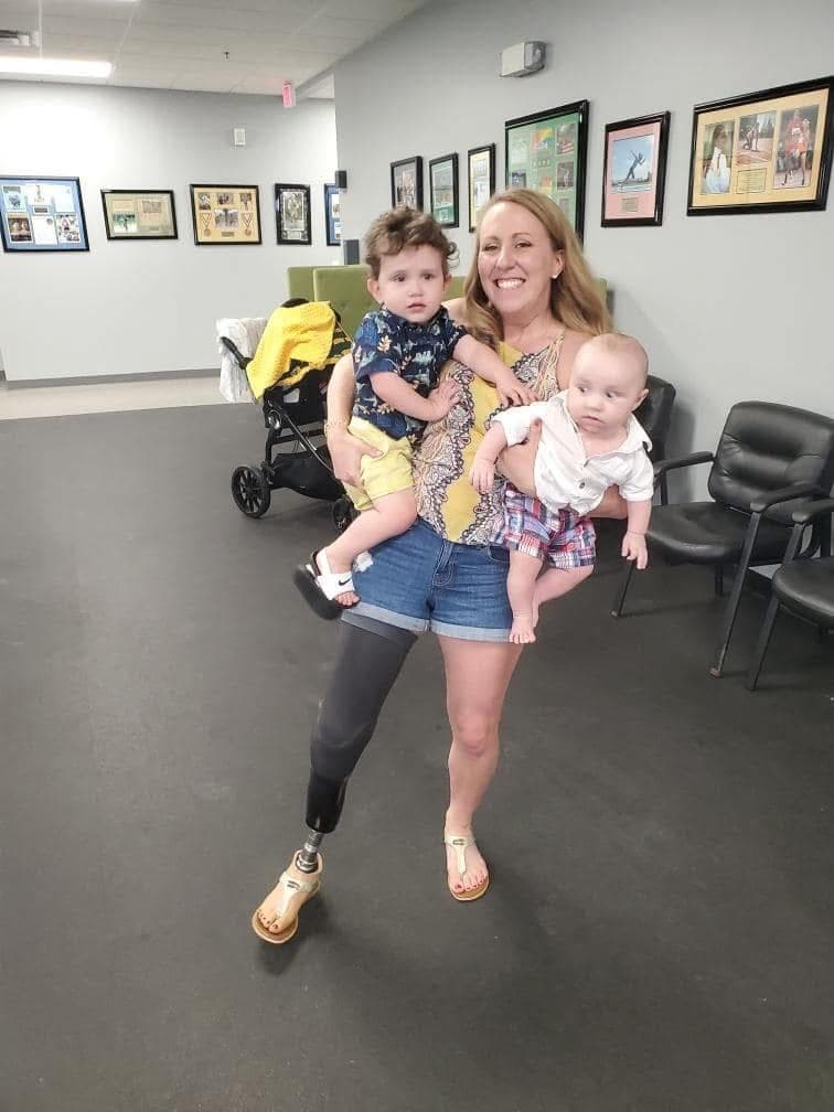 My first visit to POA as a mom of two, four months postpartum. My hands were full, but my heart was even fuller. Pictured with me are Gordon and baby Teddy.