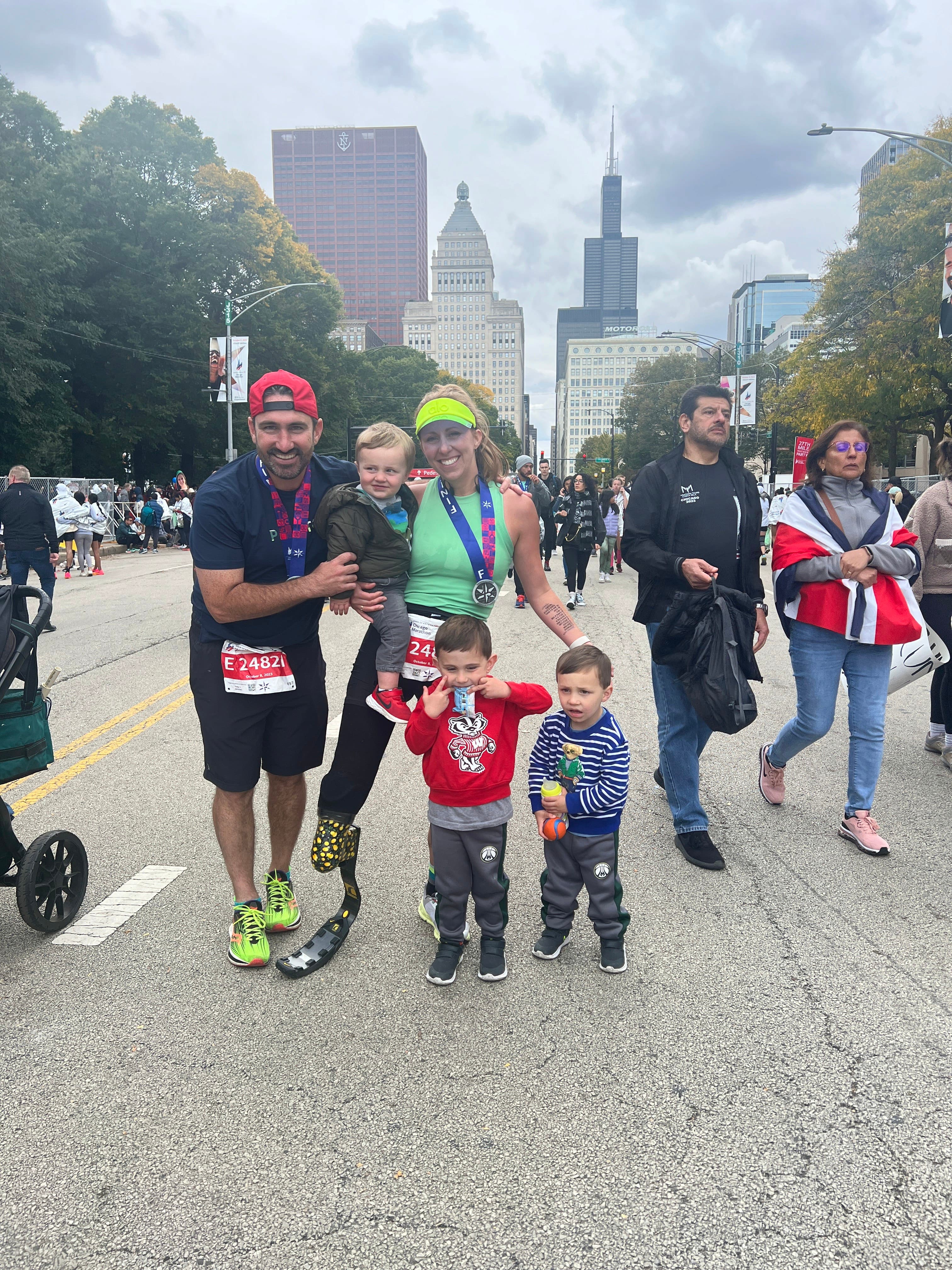 1:34 pm – Our "village" and cheering squad on marathon day. This moment was made even sweeter with them by our side, cheering us on every step of the way. Pictured here are Eric and Catherine (cousin), Jay (brother), Teddy, myself, Spencer, Gordon, Mama B (Spencer's mom), Fur (brother), and my mom and dad.